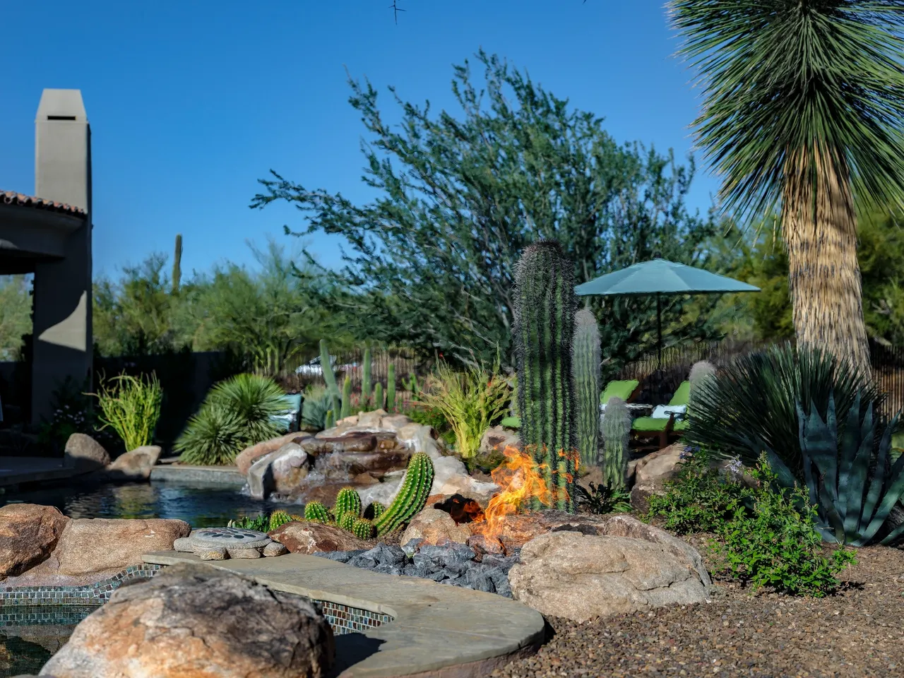 A fire pit in the middle of a garden.