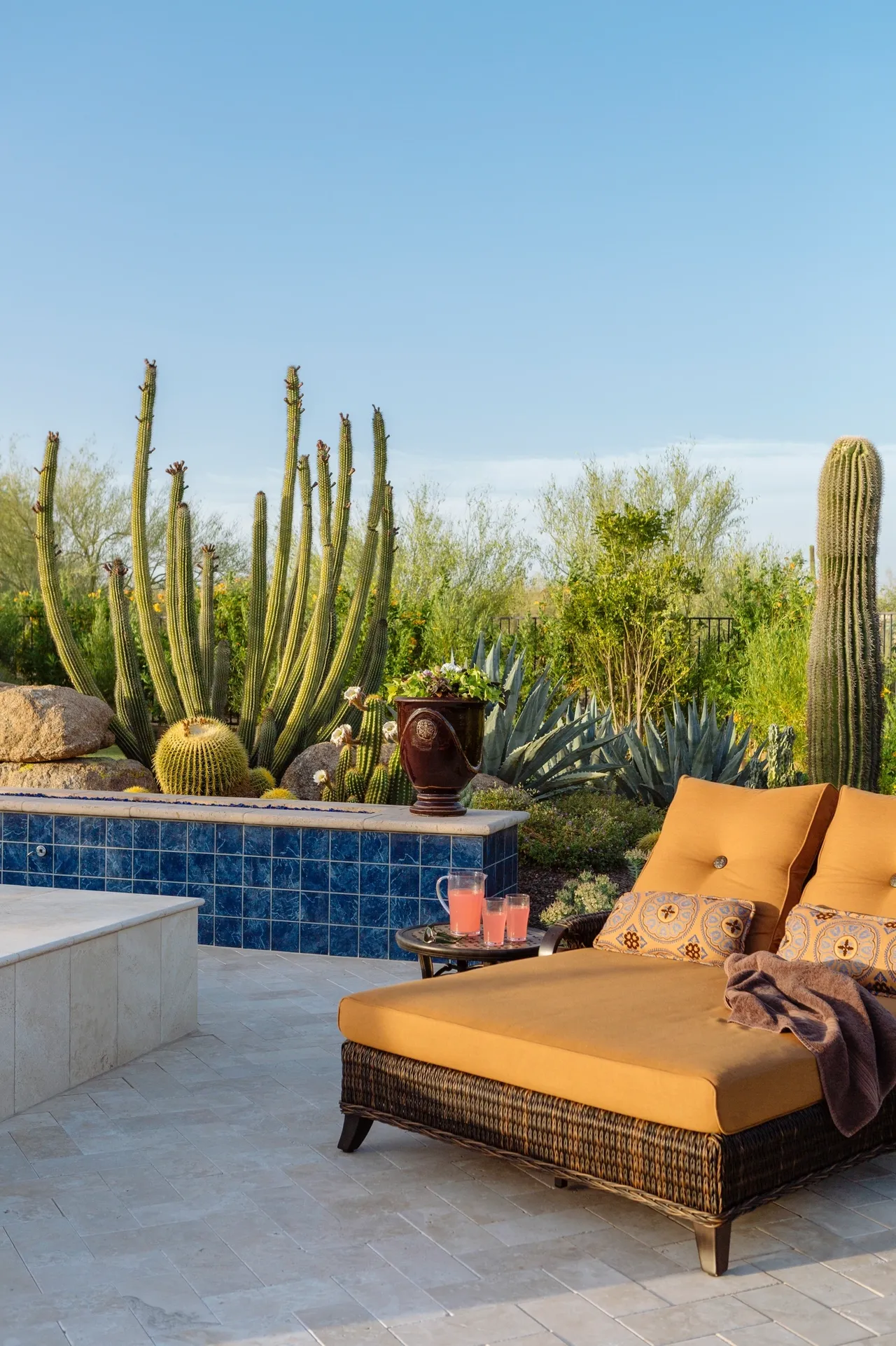 A patio with a couch and table in it